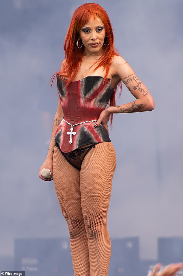 Pictured: American singer Doja Cat was seen performing at the Wireless festival earlier this month in a Union Jack corset.